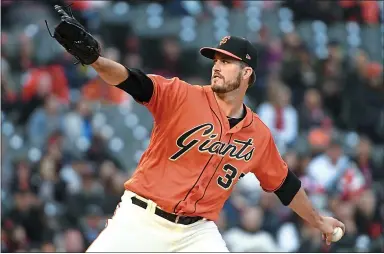  ?? DOUG DURAN — STAFF PHOTOGRAPH­ER ?? Giants starting pitcher Drew Pomeranz delivers a pitch in the first inning against the Arizona Diamondbac­ks at Oracle Park on Friday night.