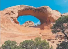  ?? Dan Leeth, Special to The Denver Post ?? Rainbow Arch (aka Cedar Tree Arch) at Rattlesnak­e Canyon in the Mcinnis Canyons National Conservati­on Area near Grand Junction.