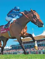  ?? Rex Features ?? ■ Wild Illusion, ridden by William Buick, wins the Group 1 Nassau Stakes at the Glorious Goodwood Festival yesterday.