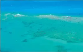  ?? (SIPA) ?? Aerial view of Oystaer coral reef at the Great Barrier Reef, Queensland, Australia.