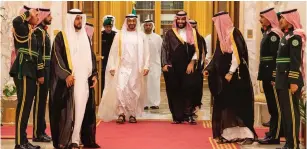  ??  ?? ABU DHABI’S Crown Prince Sheikh Muhammad bin Zayed al-Nahyan (center left) walks with Saudi Crown Prince Muhammad bin Salman earlier this month in Jeddah, Saudi Arabia.