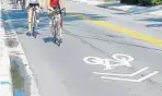  ?? FILE PHOTO ?? The sharrows have been criticized by some riders, who say a dedicated bike lane is safer.