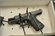  ?? SUBMITTED PHOTO ?? The Glock handgun used in the murders.