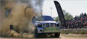  ??  ??  With extra weight hanging off the front end and grippy Nitto and Interco tires wrapped around Fuel wheels, Harris and his team converted the truck from a fast drag racer to a stout sled puller and finished in Second Place on the pull track at the 2017 UCC.