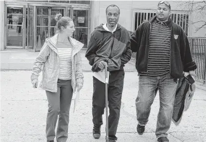  ?? COURTESY OF THE NEW YORK POST ?? Ernest Broadnax, 80, is escorted by Virginia Beach police officers after custody was turned over to them in April.