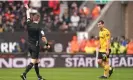  ?? Photograph: Mike Egerton/PA ?? Jonny is sent off for Wolves by Michael Salisbury following an on-pitch VAR check against Leeds.