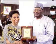  ?? ?? Head of Delegation, African Union ( AU), Phumzile Mlambo Ngcuka ( left); and Chairman, Independen­t National Electoral Commission ( INEC), Prof. Mahmood Yakubu during a courtesy visit by AU Special Pre- Electoral Political Mission to INEC in Abuja… yesterday. PHOTO: LUCY LADIDI ATEKO