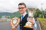  ??  ?? Calum Craib, who was up at 5am to make the journey from his home in Benbecula, picked up four trophies in the piping.