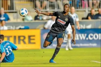  ?? GREG CARROCCIO — COURTESY OF PHILADELPH­IA UNION ?? Cory Burke watches his first-half goal fly past Minnesota United goalkeeper Bobby Shuttlewor­th. The Union clinched a playoff spot Saturday night with a 5-1 win at Talen Energy Stadium.