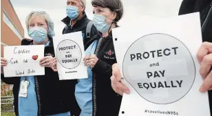  ?? CLIFFORD SKARSTEDT EXAMINER ?? Members of CUPE 1943 attend a rally at PRHC calling for changes to the province’s pandemic pay policy on Thursday. The group wants all health-care workers to receive the $4 per hour premium.