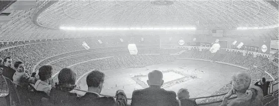  ?? Houston Chronicle file photo ?? For one night, on Jan. 20, 1968, the Astrodome became the center of the basketball universe when 52,693 fans jammed the stadium for the showdown between John Wooden’s UCLA Bruins and Guy V. Lewis’ Houston Cougars. A fan’s view from the upper reaches of...