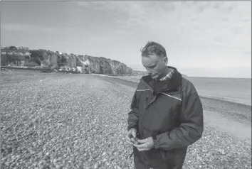  ??  ?? Dale Gibbons, the son of RHLI veteran Frank Gibbons, visited Dieppe in 2016 to see the beach where his father was wounded and his uncle Harry was killed.