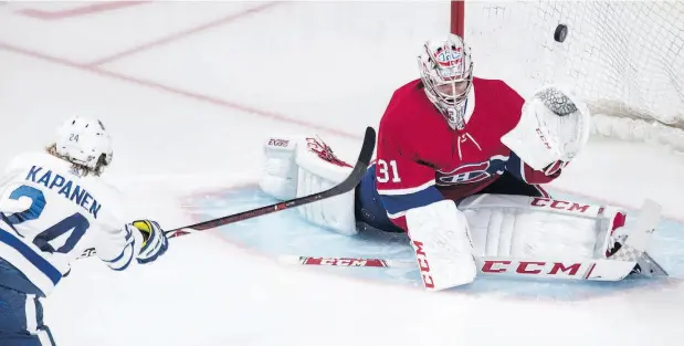  ?? GRAHAM HUGHES / THE CANADIAN PRESS ?? Habs goaltender Carey Price is beaten by Toronto’s Kasperi Kapanen during the third period of the Leafs’ 5-3 win on Wednesday in Montreal.