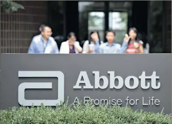  ?? FILE PHOTO: BLOOMBERG ?? Abbott Laboratori­es headquarte­rs in Abbott Park, Illinois. The combined Abbott-St Jude Medical company will have an expanded pipeline of new medical device products, increasing its bargaining power with hospitals.