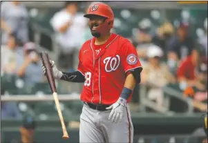  ?? The Associated Press ?? RETIRED BATTER: Washington Nationals’ Kurt Suzuki reacts after striking out to Miami Marlins pitcher Caleb Smith during the second inning of a March 10 spring training game in Jupiter, Fla. Just as sure as someone could take advantage of this year’s 60-game Major League Baseball schedule to hit .400, there are bound to be players who end up with much worse stats than they’d like.