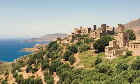  ?? ORIN DUBROW/RICK STEVES’ EUROPE ?? The fortified ghost town of Vathia, on Greece’s Mani Peninsula, was once as wild as the Wild West in the United States.