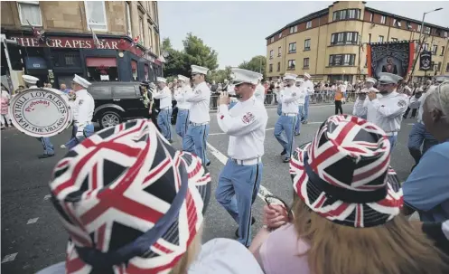  ??  ?? 0 Police say there is nothing to indicate any involvemen­t of a member from the Orange parade in Glasgow at the weekend