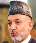  ??  ?? Afghanista­n President Hamid Karzai may benefit from an expected fragmented Parliament.