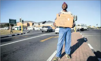  ??  ?? SOUL-DESTROYING:A man searching for work in Cape Town. Monopoly capitalism has certain features where the economy is confronted with chronic problems such as unemployme­nt.