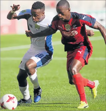 ?? Picture: FREDLIN ADRIAAN ?? RACE IS ON: Chippa United’s Vusumuzi Mncube and Ananias Gebhardt of Jomo Cosmos battle for possession during their Nedbank Cup quarterfin­al match at the Nelson Mandela Bay Stadium at the weekend