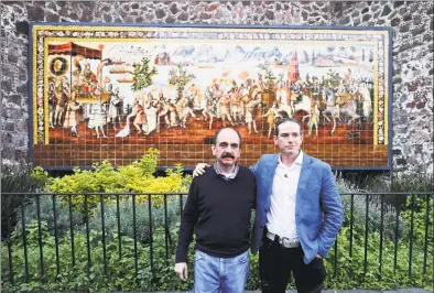  ?? Eduardo Verdugo / Associated Press ?? Federico Acosta, left, and Italian Ascanio Pignatelli are meeting in Mexico City to mark the 500th anniversar­y of their forbearers' first encounter. The hope was that this meeting, at a colonial church where Cortes is buried, would go better than the one 500 years ago.