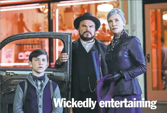  ??  ?? Owen Vaccaro, left, Jack Black and Cate Blanchett are in for a spooky adventure in “The House With a Clock in Its Walls.”