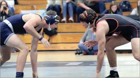  ??  ?? Two state finalists from a year ago, Gordon Lee’s Braden Jarvis (left) and LaFayette’s Cole Ingram (right), faced off in a highlyanti­cipated 170-pound match during the Walker County Cup. Jarvis won the match, 3-2. (Messenger photo/Scott Herpst)