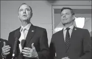  ?? PATRICK SEMANSKY / AP ?? U.S. Rep. Adam Schiff, D-Calif., left, and Rep. Eric Swalwell, D-Calif., speak with members of the media on Capitol Hill in Washington in May 2019. The Justice Department under former President Donald Trump secretly seized data from the accounts of the two Democratic lawmakers in 2018 as part of an aggressive crackdown on leaks related to the Russia investigat­ion and other national security matters, according to three people familiar with the seizures.