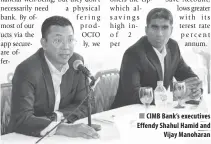  ??  ?? CIMB Bank’s executives Effendy Shahul Hamid and Vijay Manoharan