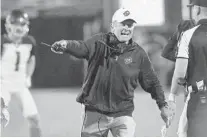  ??  ?? Orlando coach Steve Spurrier yells during the Atlanta Legends at Orlando Apollos Alliance of America football game at Spectrum Stadium in Orlando on Saturday.