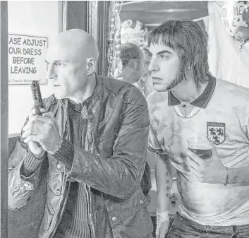  ?? Sony Pictures ?? Mark Strong, left, and Sacha Baron Cohen star in “The Brothers Grimsby.”