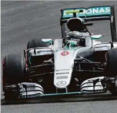  ?? AP ?? Mercedes driver Nico Rosberg takes a curve during a practice round in Hockenheim, Germany, yesterday.