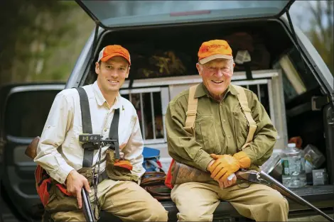  ?? BRIAN GROSSENBAC­HER — COURTESY OF ORVIS VIA AP ?? Simon Perkins, left, sits with his grandfathe­r Leigh Perkins. Leigh Perkins, who transforme­d the Vermont-based Orvis company from a niche fly-fishing supply company into a global retailer of outdoor supplies, apparel and protector of the environmen­t has died. He was 93. Leigh Perkins died May 7in Monticello, Florida. Simon Perkins is now the company president, the third generation of his family to lead the company.