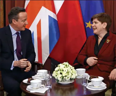  ??  ?? Roadblock fears: David Cameron meets Polish prime minister Beata Szydlo in Warsaw yesterday