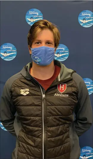  ?? SUBMITTED PHOTO — CORONADO SWIM ASSOCIATIO­N ?? David Abrahams poses after setting the American record in the men’s SB13100-meter breaststro­ke at the World Para Swimming Series in Lewisville, Texas, in April.