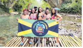  ?? ?? Fletcher accompanie­s his happy clients (from left) Yolanda Thomas, Yolene Joseph, Nikesha McIntosh, Anastasia Dosunmu and Adeola Dosunmu on Lethe river bamboo rafting adventure in Montego Bay.