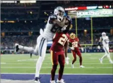  ?? RON JENKINS — THE ASSOCIATED PRESS FILE ?? Dallas’ Dez Bryant (88) catches a pass for a touchdown over Washington cornerback Bashaud Breeland (26) last November in Arlington, Texas.