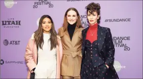  ?? Arthur Mola / Associated Press ?? Actors, from left, Gina Rodriguez and Evan Rachel Wood pose with writer-director Miranda July at the premiere of “Kajilliona­ire” during the 2020 Sundance Film Festival in Park City, Utah.