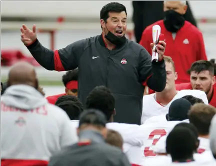  ?? ASSOCIATED PRESS FILE PHOTO ?? Ohio State head coach Ryan Day talks to his team during practice earlier this season. As Alabama, Ohio State, Clemson, Oregon, Notre Dame, Oklahoma and Florida prepared to play for conference championsh­ips, they signed top-10 recruiting classes for 2021 Wednesday.
