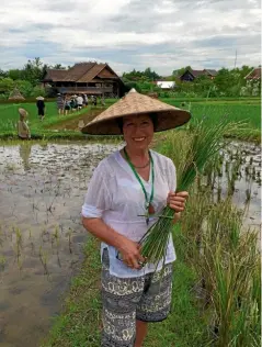  ?? PHOTOS: JUSTINE TYERMAN ?? Justine Tyerman at Living Land Farm, a rice paddy and organic farm near Luang Prabang.