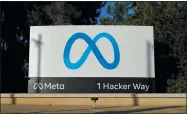  ?? GODOFREDO A. VÁSQUEZ/ASSOCIATED PRESS ?? Meta’s logo can be seen on a sign at the company’s headquarte­rs in Menlo Park, Calif., Nov. 9, 2022. Meta, which is Facebook’s parent company, allowed a Moldovan oligarch with ties to the Kremlin to run ads on its platform urging protests against that country’s government — even though he and his political party are subject to U.S. sanctions.
