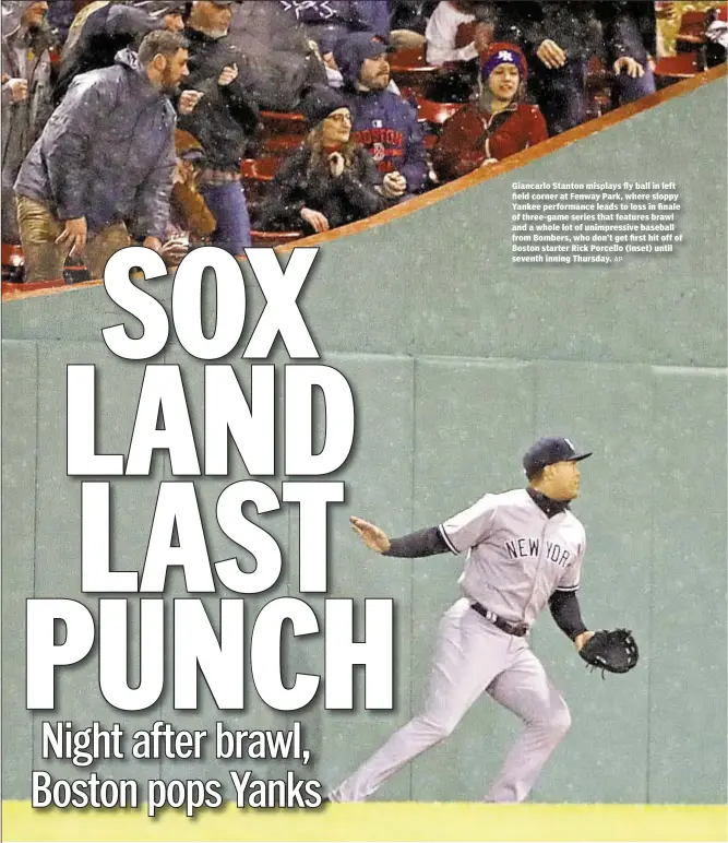  ?? AP ?? Giancarlo Stanton misplays fly ball in left field corner at Fenway Park, where sloppy Yankee performanc­e leads to loss in finale of three-game series that features brawl and a whole lot of unimpressi­ve baseball from Bombers, who don’t get first hit off...
