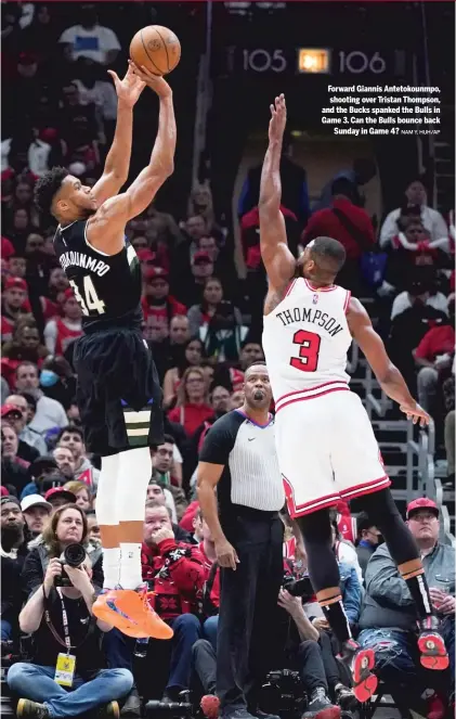  ?? NAM Y. HUH/AP ?? Forward Giannis Antetokoun­mpo, shooting over Tristan Thompson, and the Bucks spanked the Bulls in Game 3. Can the Bulls bounce back Sunday in Game 4?