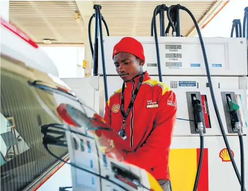  ?? Picture: Moeletsi Mabe ?? The recent fuel price increase may have hurt consumers, but economists say a slight uptick in spending may augur well for the economy.