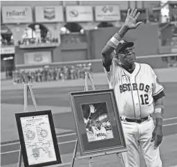  ?? DAVID J. PHILLIP/AP ?? Astros manager Dusty Baker Jr. is honored before a game against the Mariners on Wednesday, a day after he won his 2,000th game.