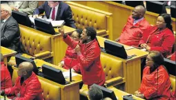  ?? PICTURE: ESA ALEXANDER ?? MAKING A POINT: The EFF reacts in the National Assembly, delaying the start of Finance Minister Malusi Gigaba’s medium-term budget speech