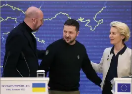  ?? EFREM LUKATSKY — THE ASSOCIATED PRESS ?? Ukrainian President Volodymyr Zelenskyy, center, speaks with European Council President Charles Michel, left, and European Commission President Ursula von der Leyen.