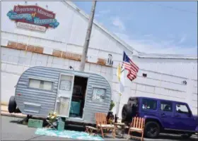  ?? JESI YOST — FOR MEDIANEWS GROUP ?? A 1961 Winnebago owned by Dave and Janice Coon in front of the Boyertown Museum of Historic Vehicles on South Walnut Street during The Truck Stops Here Mobile Madness event on June 29.