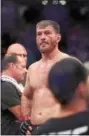  ?? TIM PHILLIS — THE NEWS-HERALD ?? Stipe Miocic, after being knocked out by new UFC heavyweigh­t champion Daniel Cormier on July 7 in Las Vegas.