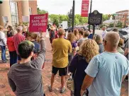  ?? ED RICHTER/STAFF ?? Pro-abortion supporters hold a rally Tuesday night in front of the Lebanon City Building before the Lebanon City Council meeting.